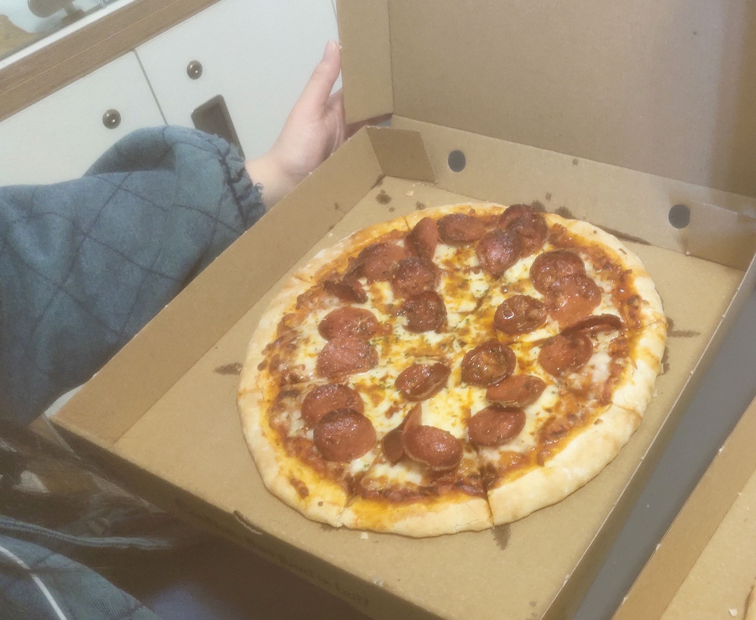 Image may contain: Food, Pizza
