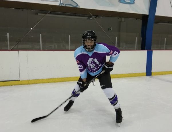 Image may contain: Ice Hockey, Ice Skating, Rink, Skating, Helmet, Apparel, Clothing, People, Sports, Sport, Team Sport, Team, Hockey, Person, Human