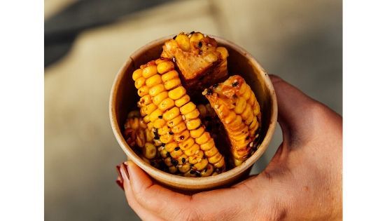 Image may contain: Bowl, Corn, Vegetable, Food, Person, Human, Plant