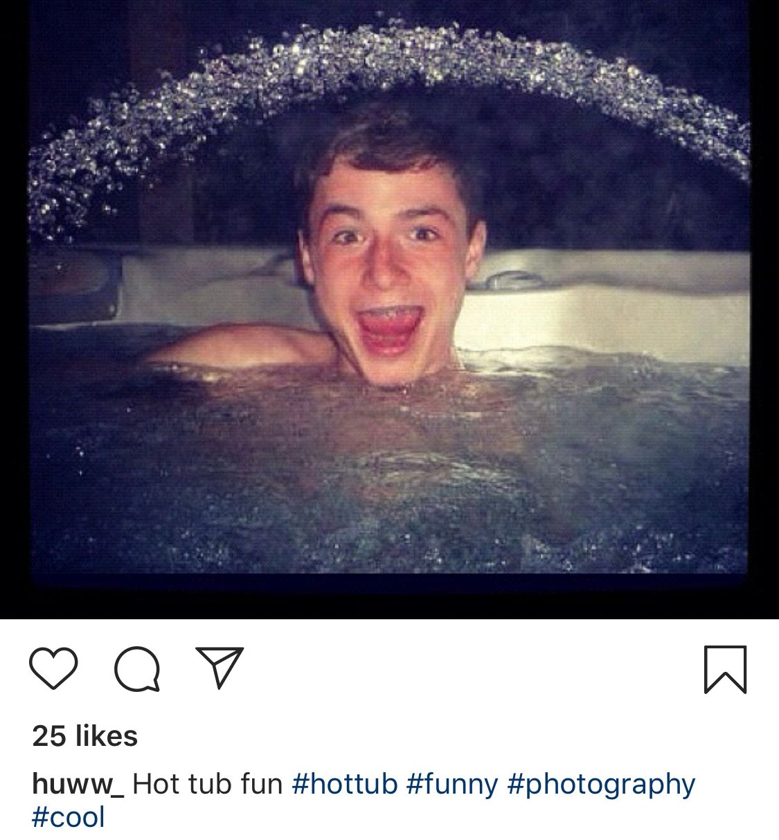 Image may contain: Jacuzzi, Hot Tub, Tub, Smile, Face, Human, Person, Water