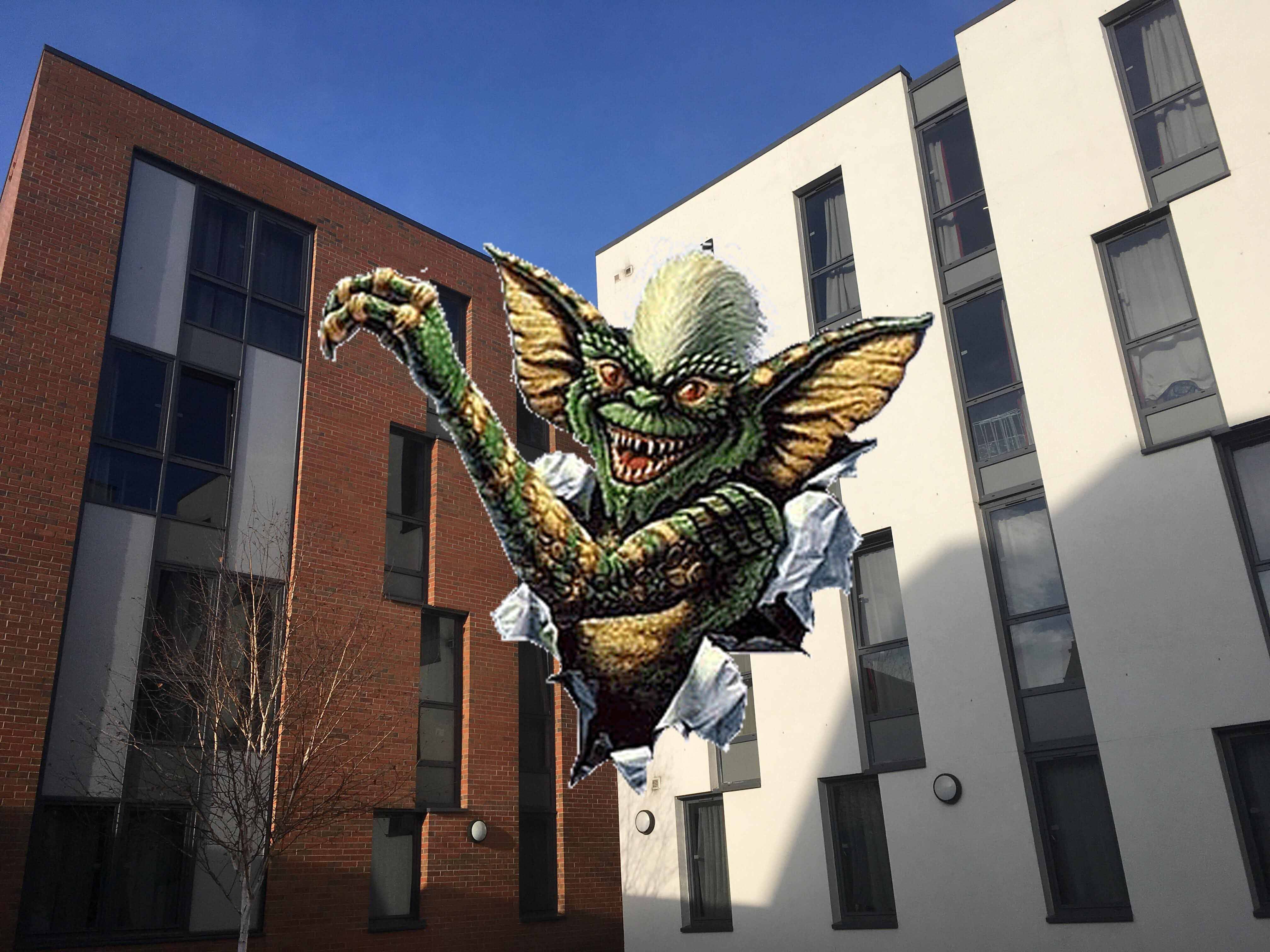 Image may contain: Dragon, Produce, Plant, Pineapple, Fruit, Food, Flora, Statue, Sculpture, Ornament, Gargoyle, Art, Urban, Town, Skyscraper, High Rise, City, Window, Skylight, Building, Architecture