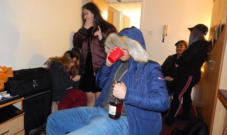 Image may contain: Party, Furniture, Couch, Person, People, Human