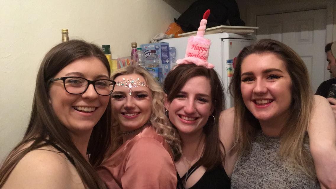 Image may contain: Smile, Portrait, Face, Bottle, Person, People, Human