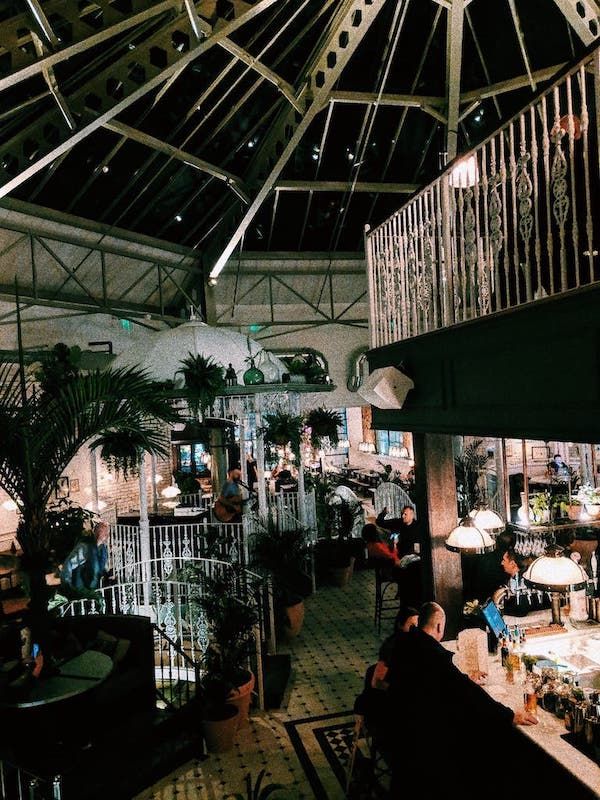 Image may contain: Meal, Plant, Table, Chair, Cafe, Cafeteria, Furniture, Human, Person, Food Court, Food, Restaurant