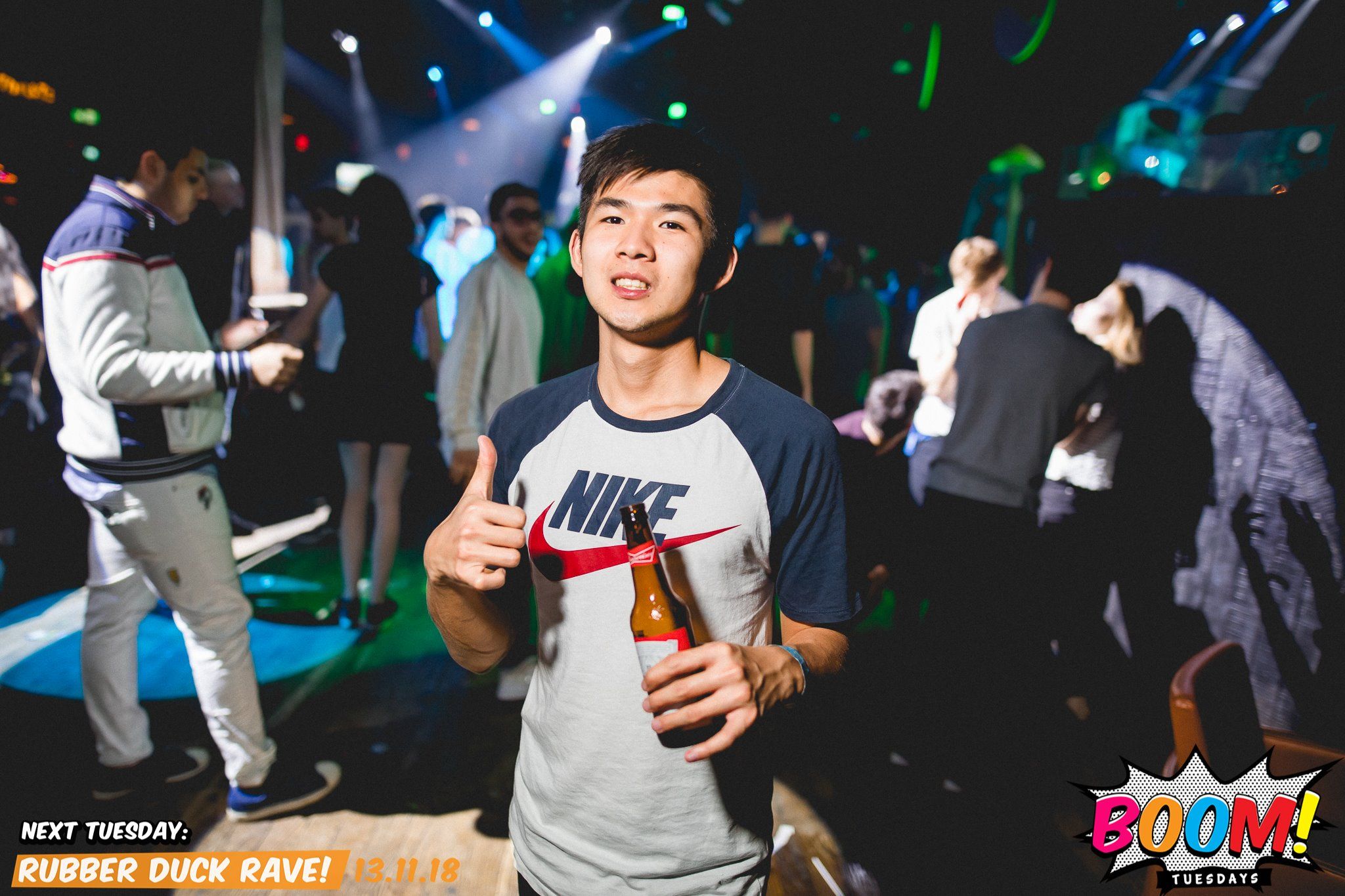 Image may contain: Night Life, Crowd, Shoe, Footwear, Shorts, Night Club, Apparel, Clothing, Club, Human, Person