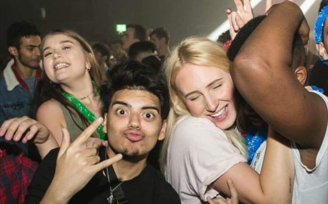 Image may contain: People, Head, Night Life, Indoors, Interior Design, Night Club, Face, Club, Human, Person, Party