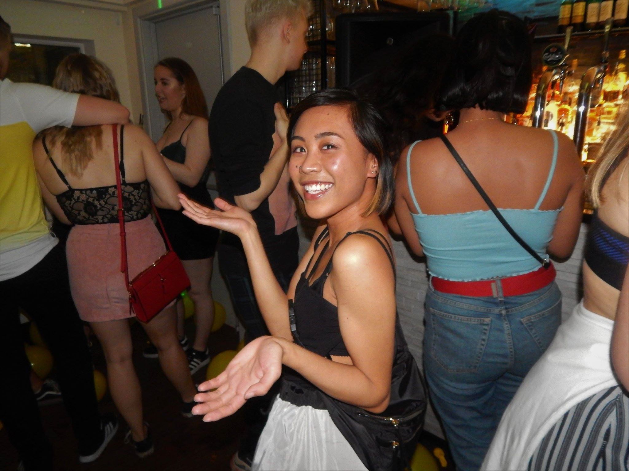 Image may contain: Footwear, Shoe, Clothing, Apparel, Bar Counter, Pub, Night Life, Night Club, Club, Human, Person