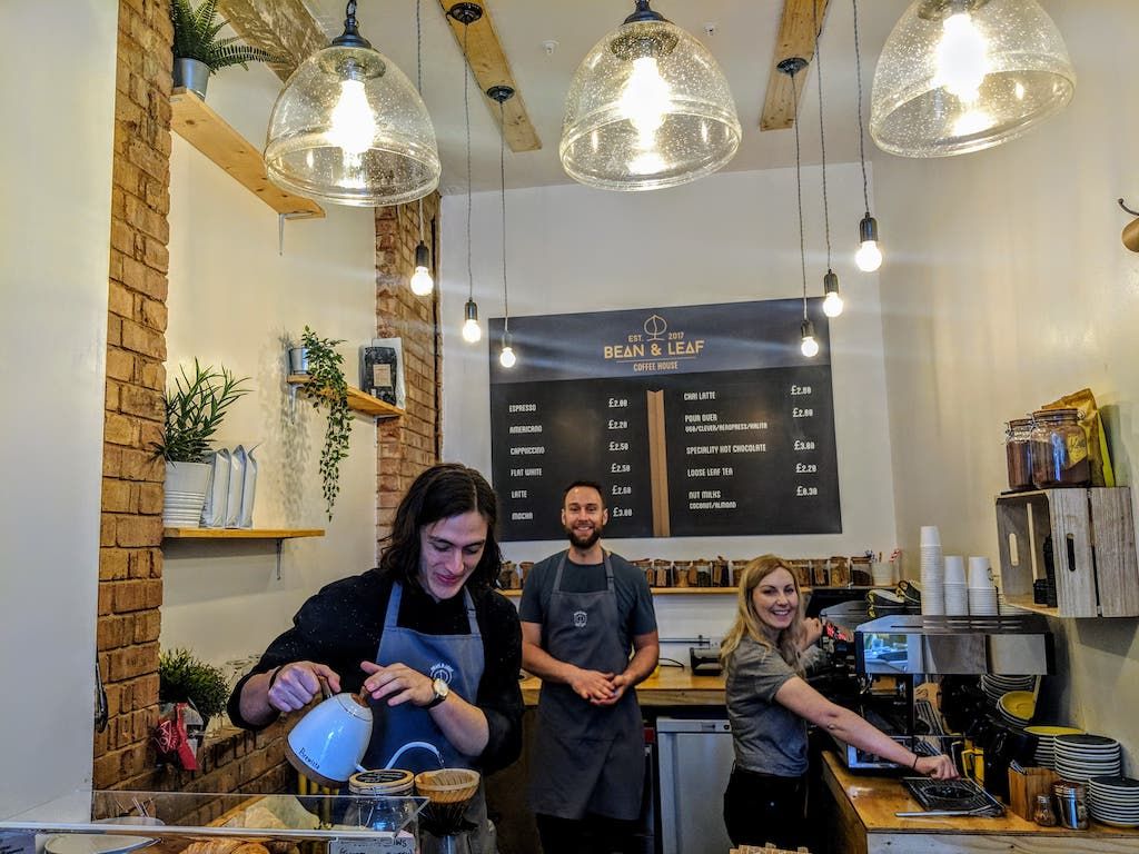 Image may contain: Light Fixture, Cafeteria, Lighting, Cafe, Restaurant, Person, Human