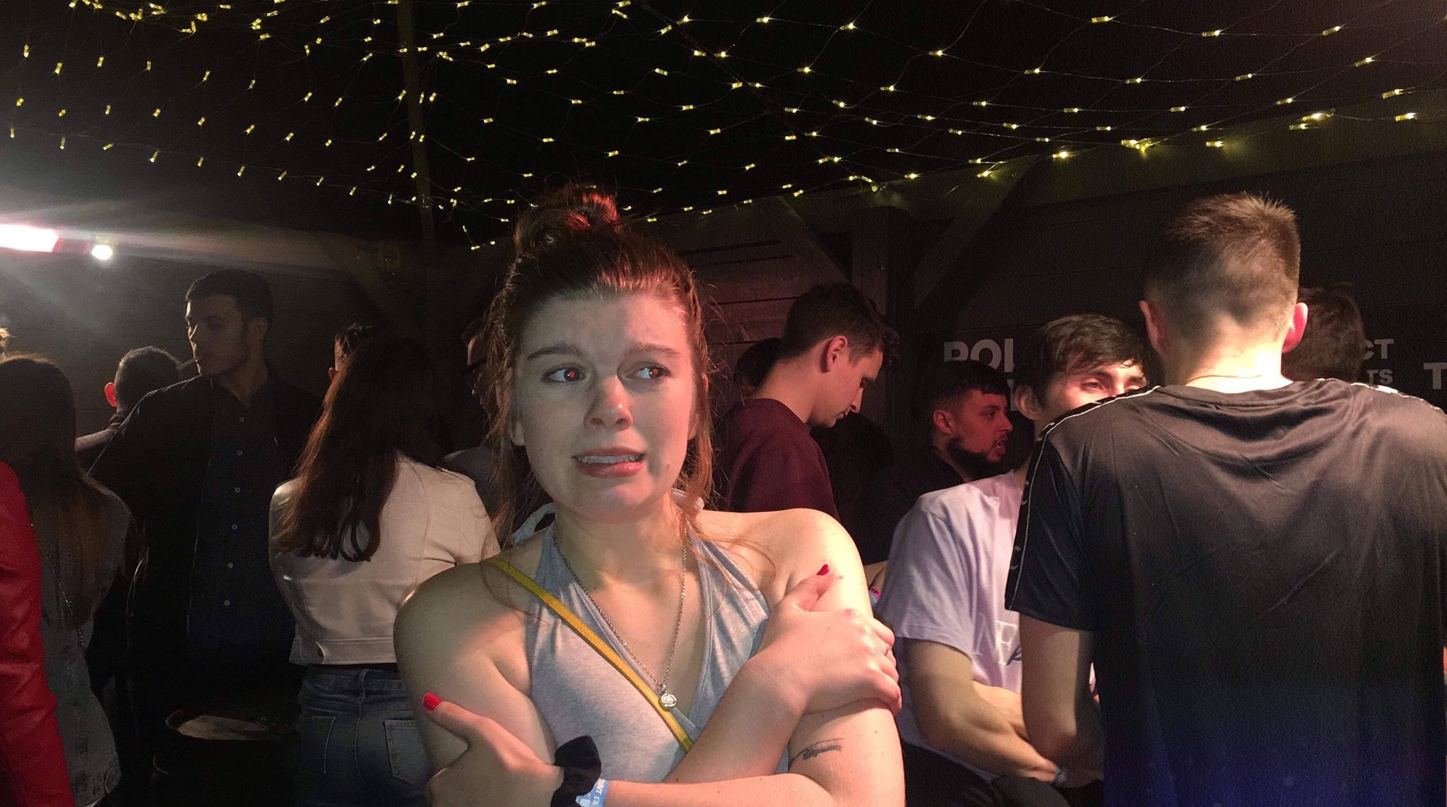 Image may contain: Skin, Night Life, Night Club, Bar Counter, Pub, Club, Person, Human