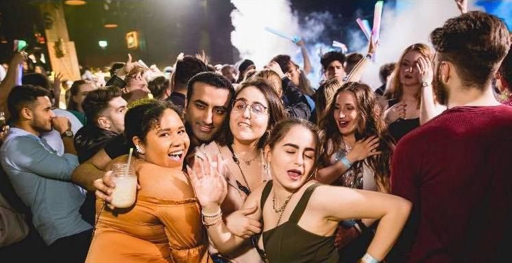 Image may contain: Photo, Portrait, Photography, People, Crowd, Spring Break, Face, Tourist, Vacation, Party, Night Life, Person, Human