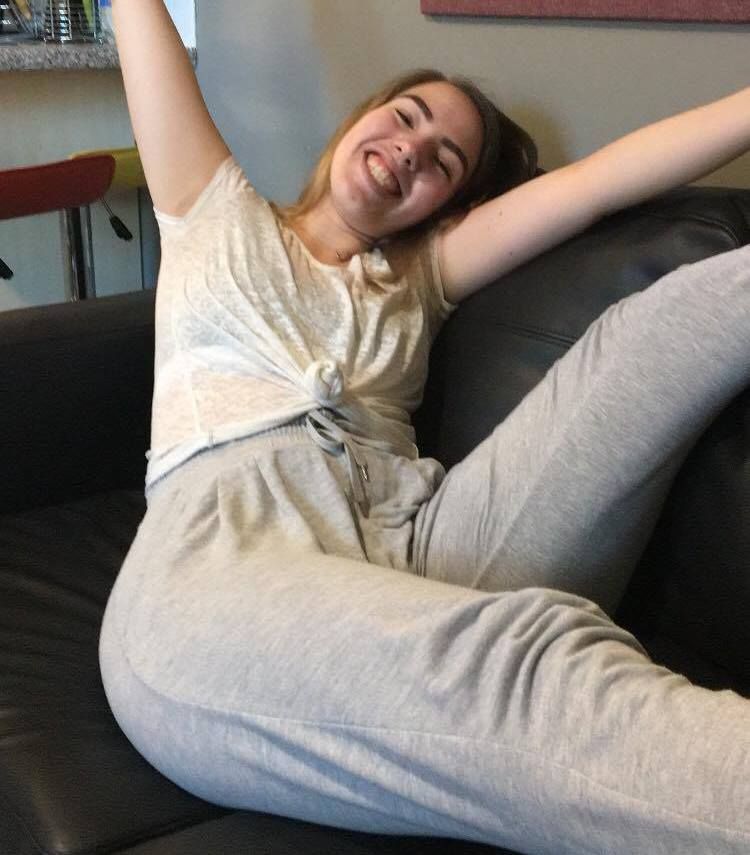Image may contain: Photography, Portrait, Photo, Heel, Female, Chair, Pants, Clothing, Apparel, Human, Person, Face, Pillow, Cushion, Couch, Furniture