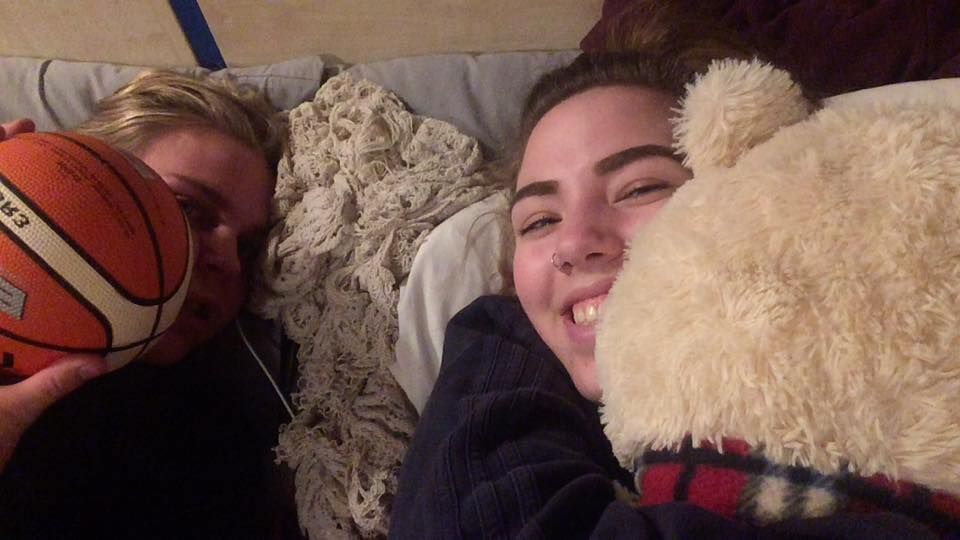 Image may contain: Teen, Laughing, Kid, Child, Indoors, Plush, Toy, Girl, Selfie, Woman, Apparel, Clothing, Bed, Couch, Photo, Portrait, Photography, Female, Head, Furniture, Smile, Person, Face, Human, Cushion, Pillow