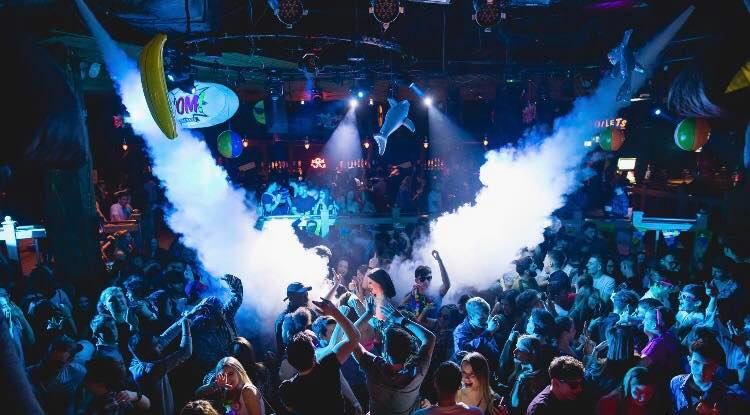 Image may contain: Lighting, Disco, Night Club, Person, Human, Club