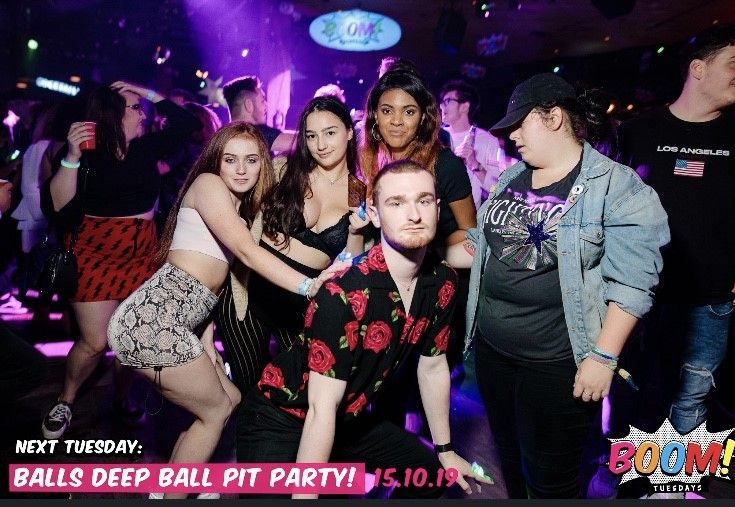 Image may contain: Disco, Night Club, Club, Party, Human, Person