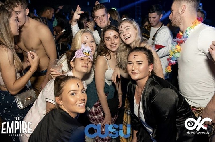 Image may contain: Night Club, Club, Face, Night Life, Human, Person, Party