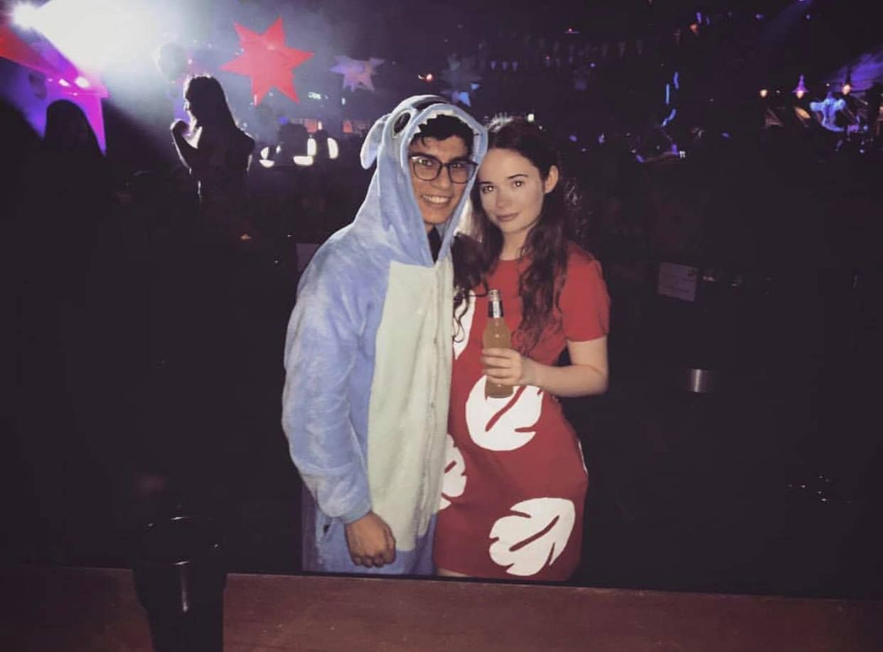 Image may contain: Coat, Face, Night Club, Night Life, Club, Party, Apparel, Clothing, Human, Person