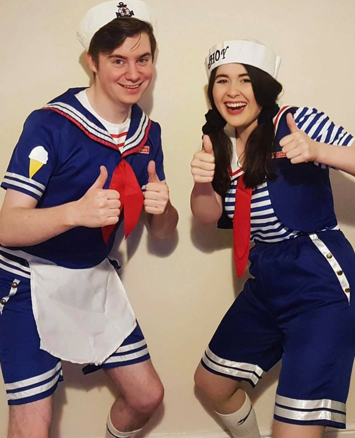 Image may contain: Finger, Sailor Suit, Human, Person