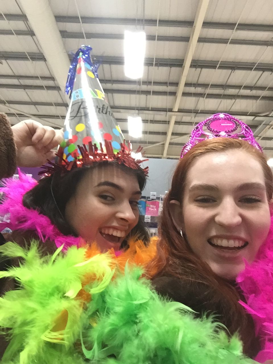 Image may contain: Hat, Feather Boa, Scarf, Person, Human, Clothing, Apparel