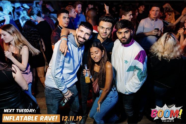 Image may contain: Night Life, Crowd, Audience, Night Club, Club, Party, Person, Human