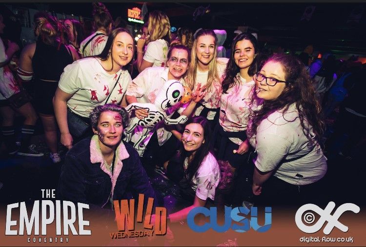 Image may contain: People, Costume, Portrait, Photography, Photo, Accessory, Glasses, Accessories, Smile, Female, Apparel, Clothing, Face, Party, Human, Person