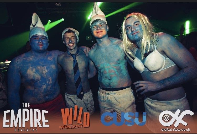 Image may contain: People, Head, Night Club, Face, Party, Club, Apparel, Clothing, Human, Person, Costume
