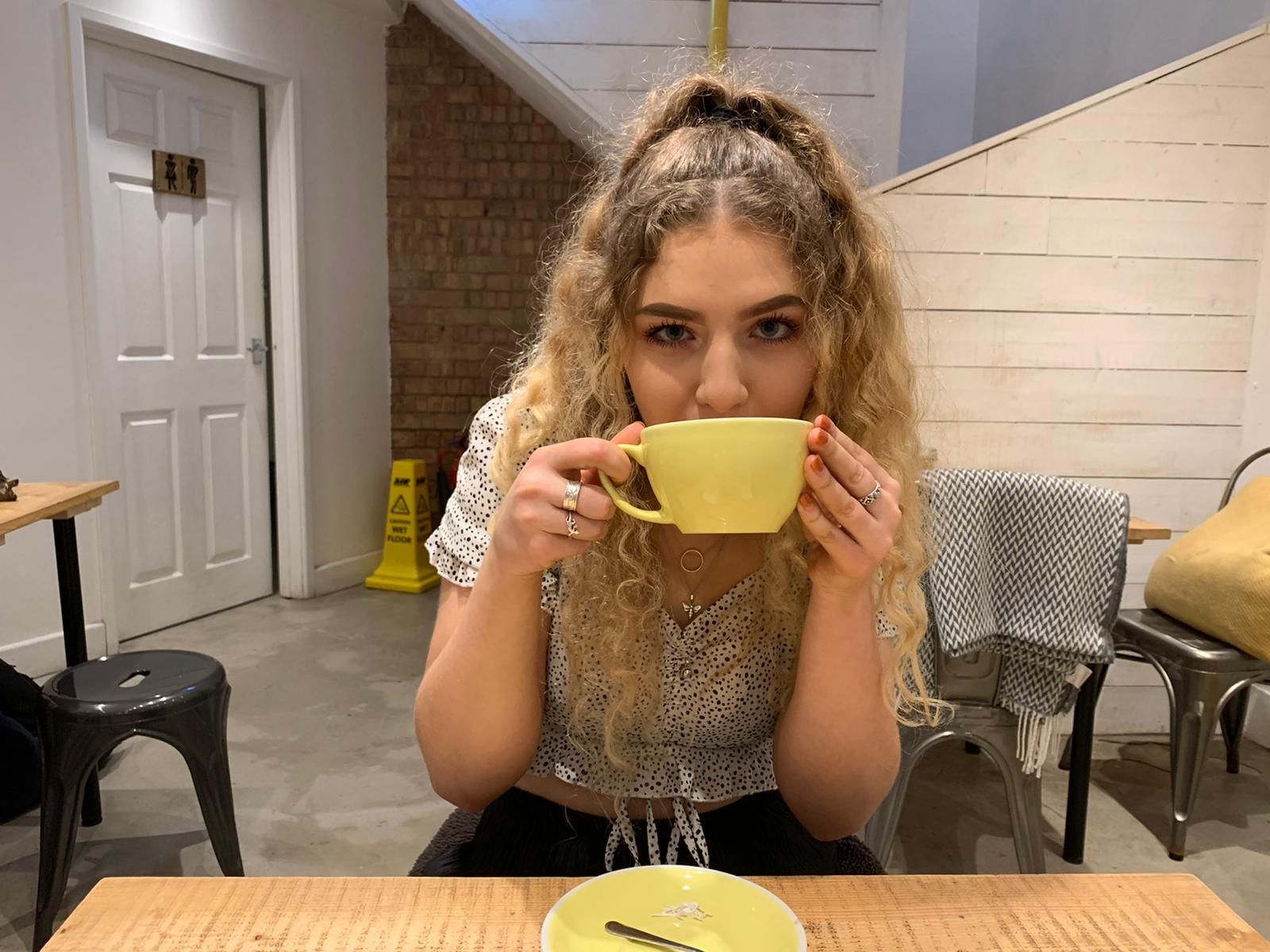 Image may contain: Coffee Cup, Cup, Bowl, Hardwood, Home Decor, Chair, Furniture, Plywood, Person, Human, Wood