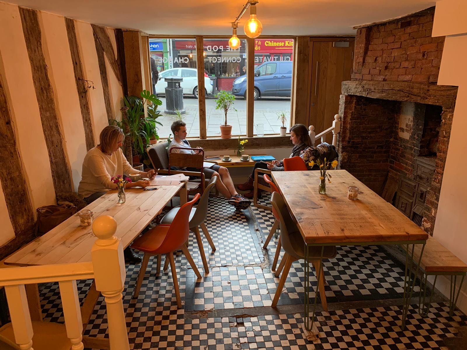 Image may contain: Floor, Vehicle, Automobile, Transportation, Car, Flooring, Hardwood, Cafeteria, Cafe, Plywood, Furniture, Chair, Person, Human, Restaurant, Wood