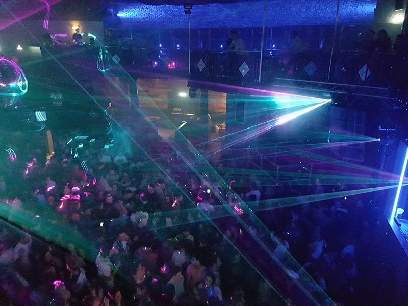 Image may contain: Light, Laser, Festival, Club