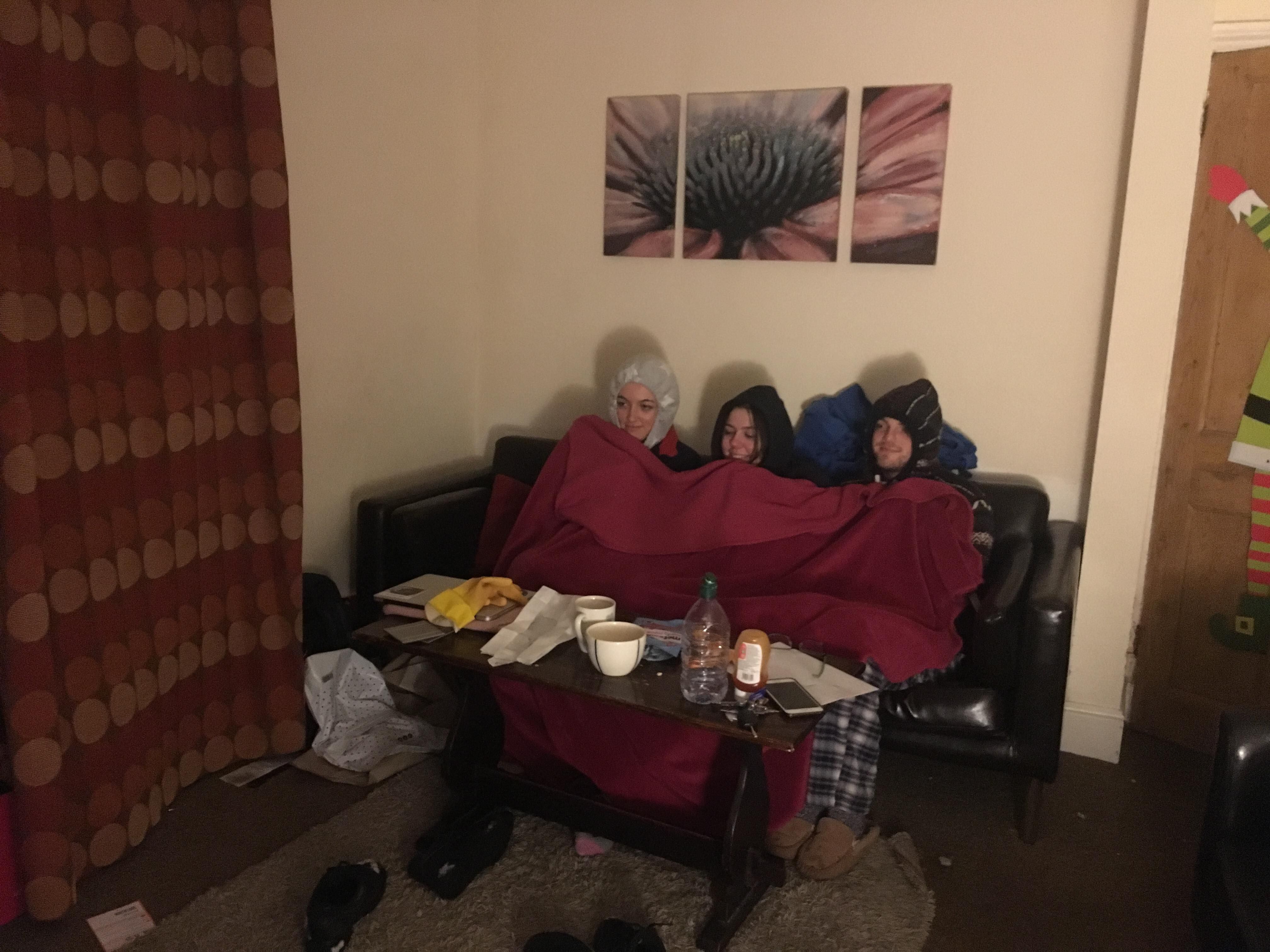 Image may contain: Person, People, Human, Suitcase, Luggage, Furniture, Couch