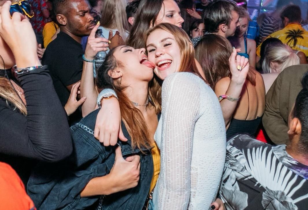 Image may contain: Audience, Crowd, Face, Night Club, Club, Night Life, Human, Person, Party