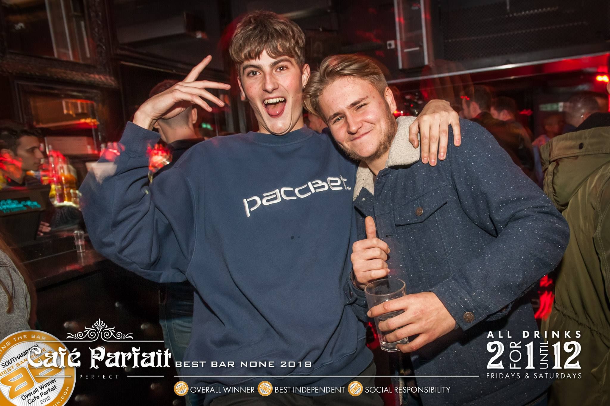 Image may contain: Bar Counter, Pub, Human, Person, Night Club, Club