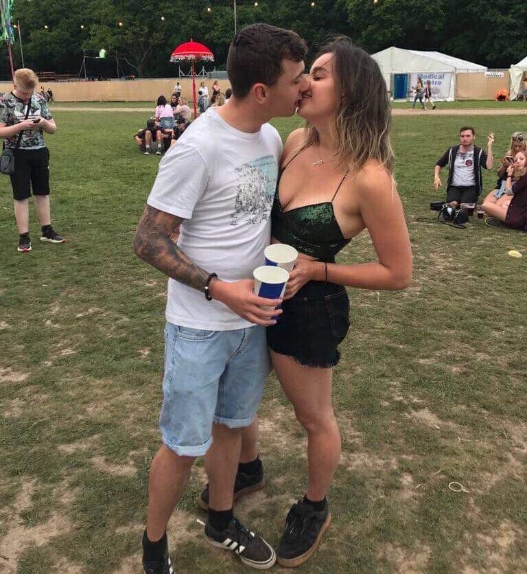 Image may contain: Meal, Food, Female, Plant, Grass, Skin, Kiss, Kissing, Shorts, Person, Human, Clothing, Apparel, Shoe, Footwear