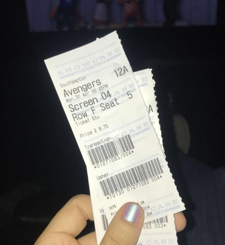 Image may contain: Ticket, Human, Person, Paper, Text, Book