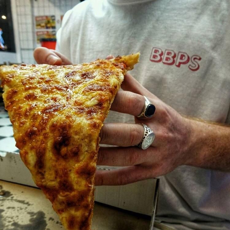 Image may contain: Finger, Jewelry, Ring, Accessories, Accessory, Person, Human, Pizza, Food