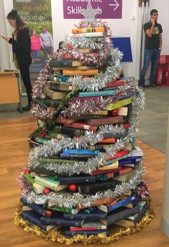 Image may contain: Food, Wedding Cake, Dessert, Cake, Christmas Tree, Ornament, Person, Human, Tree, Plant