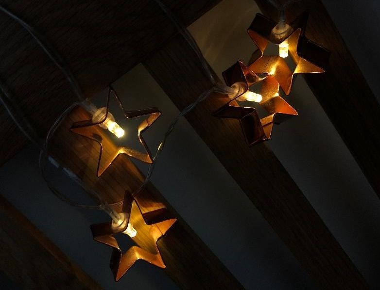Image may contain: Lamp, Symbol, Star Symbol, Lighting