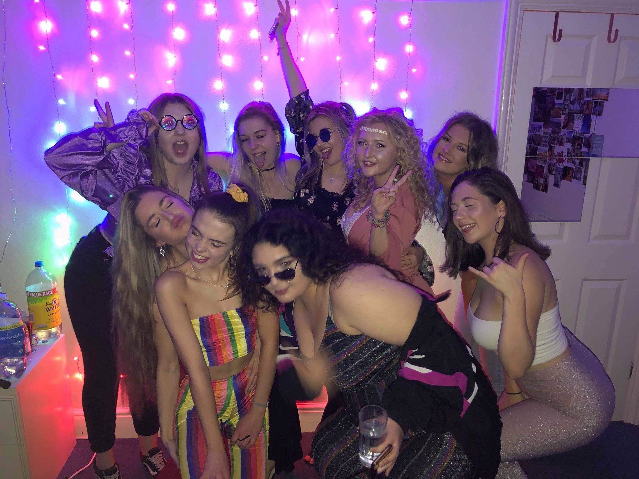 Image may contain: Night Life, Night Club, Club, Accessory, Sunglasses, Accessories, Party, Human, Person