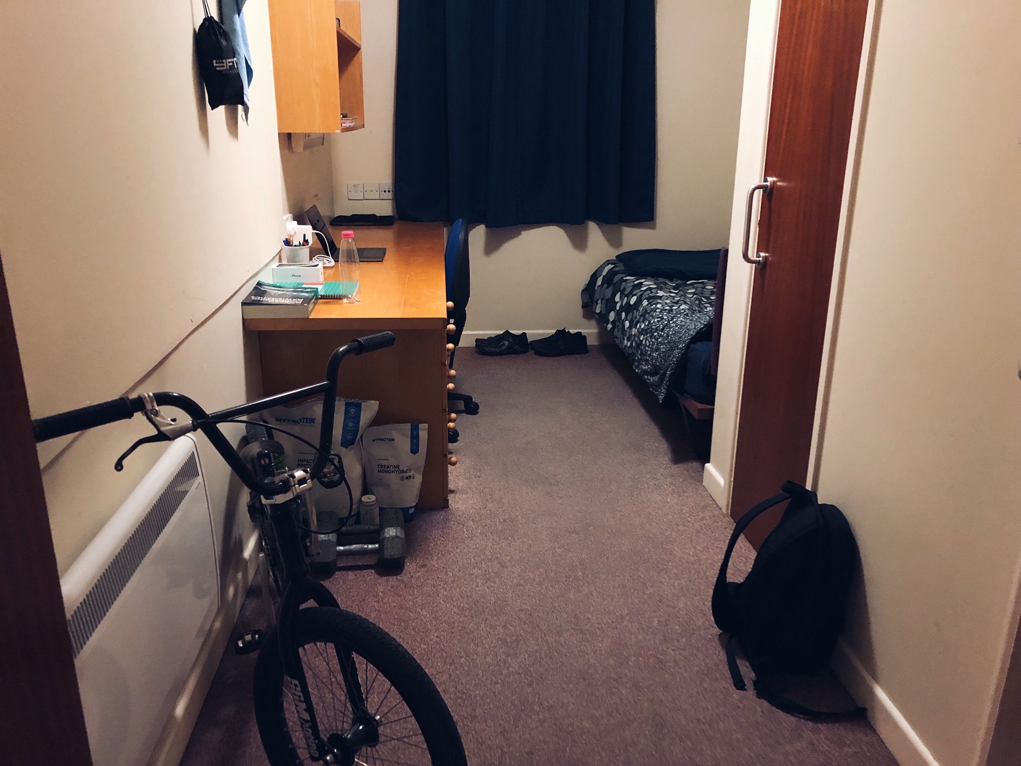 Image may contain: Dorm Room, Flooring, Room, Bedroom, Indoors, Bicycle, Bike, Vehicle, Transportation, Machine, Wheel