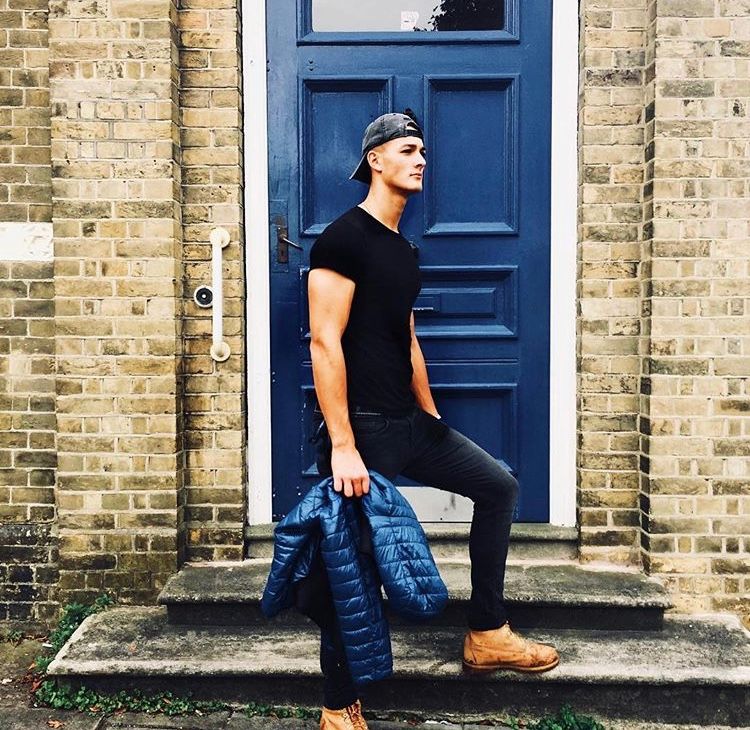 Image may contain: Pants, Brick, Walkway, Path, Boot, Home Decor, Person, Human, Footwear, Shoe, Door, Clothing, Apparel