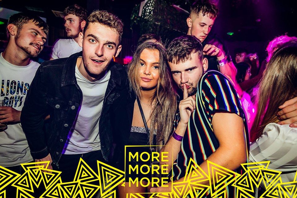 Image may contain: Disco, Night Club, Club, Party, Person, Human