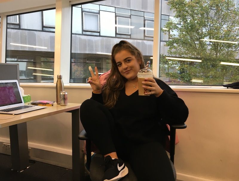 Image may contain: Chair, Table, Apparel, Clothing, Furniture, Sitting, Restaurant, Teen, Girl, Blonde, Woman, Child, Kid, Female, Home Decor, Human, Person