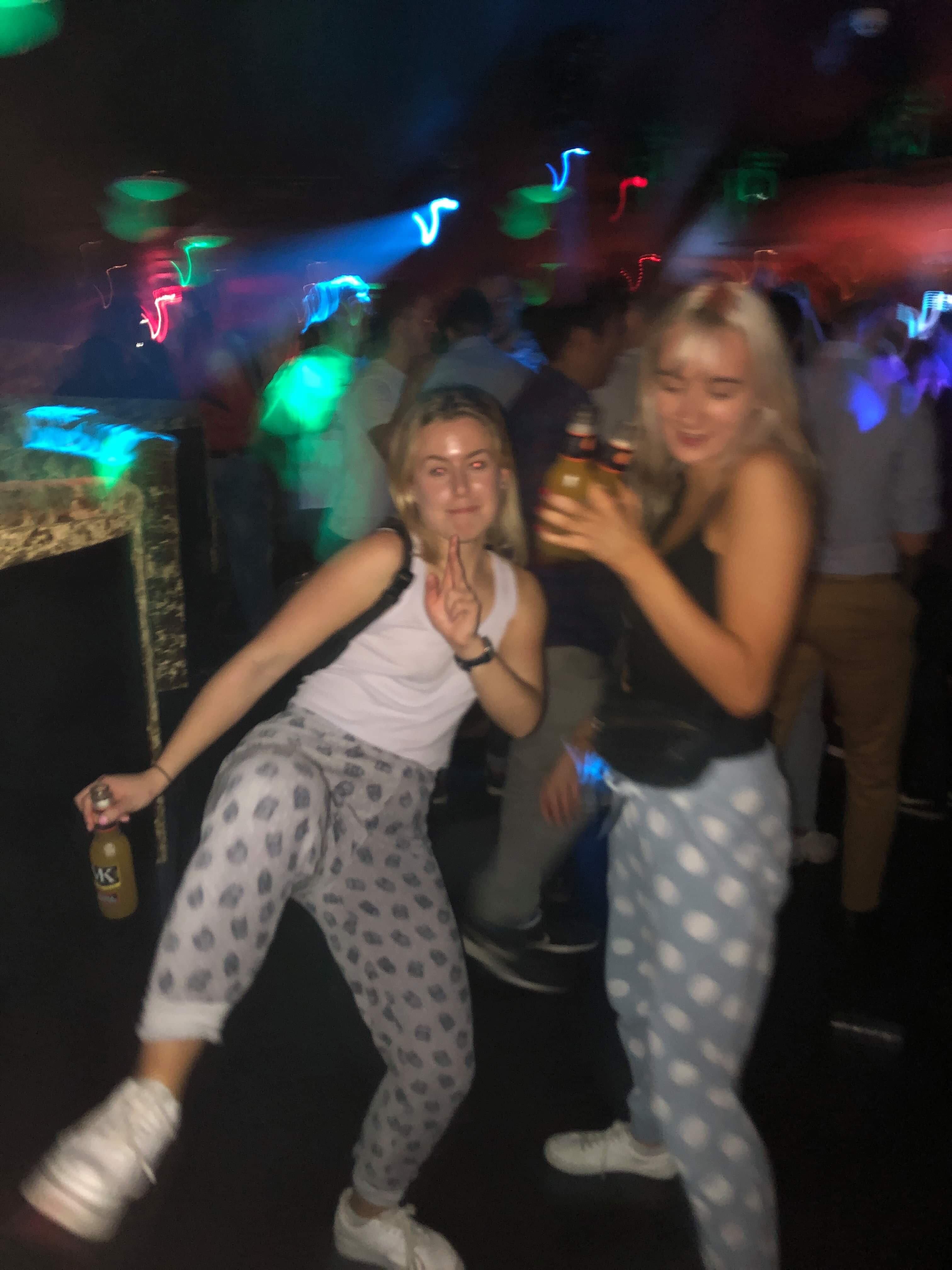 Image may contain: Disco, Night Life, Night Club, Club, Human, Person