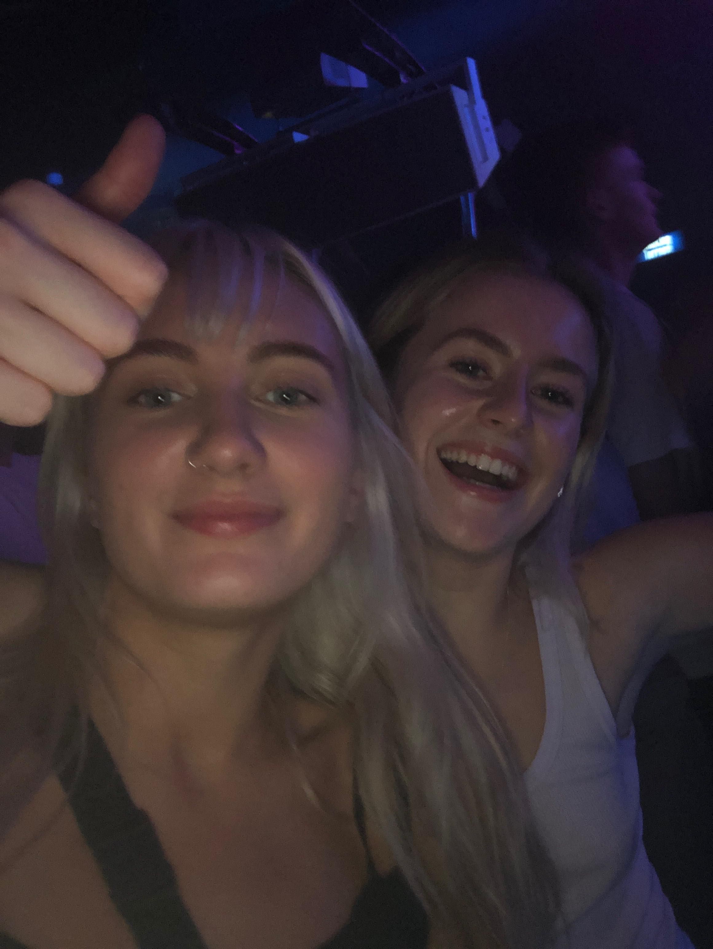 Image may contain: Night Life, Thumbs Up, Person, Human, Finger