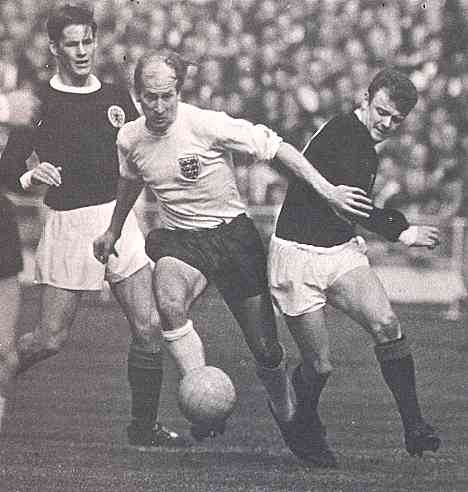 Sir Bobby (centre) in his playing days