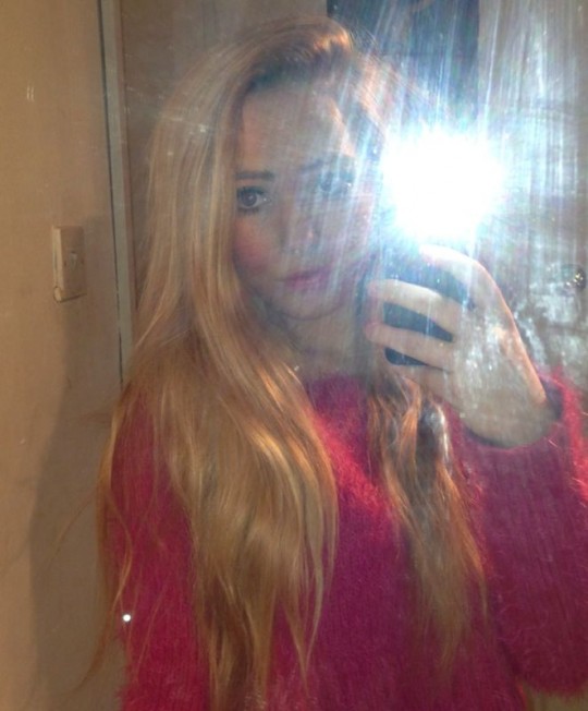 Can't even see her face. Surely that's defeating the point? A common feature among flashed selfies.