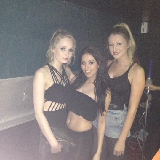 These midriff bearing three remain anonymous, but they look great.