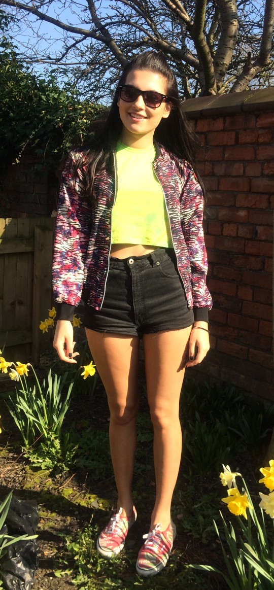 Robyn Harker is a 2nd year Fashion and Textile Retailing student and has spent this week sunbathing in the garden. What a lovely way to enjoy the sun! We love her patterned bomber jacket here and her home-made tie-dyed tee! A great mix of colour, perfect for the summer sun!
