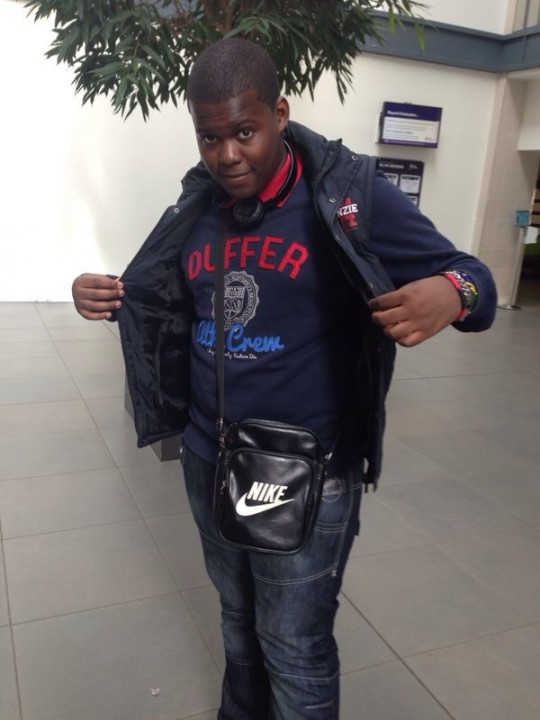Alpha student at Leeds Metropolitan showcases his Nike Manbag