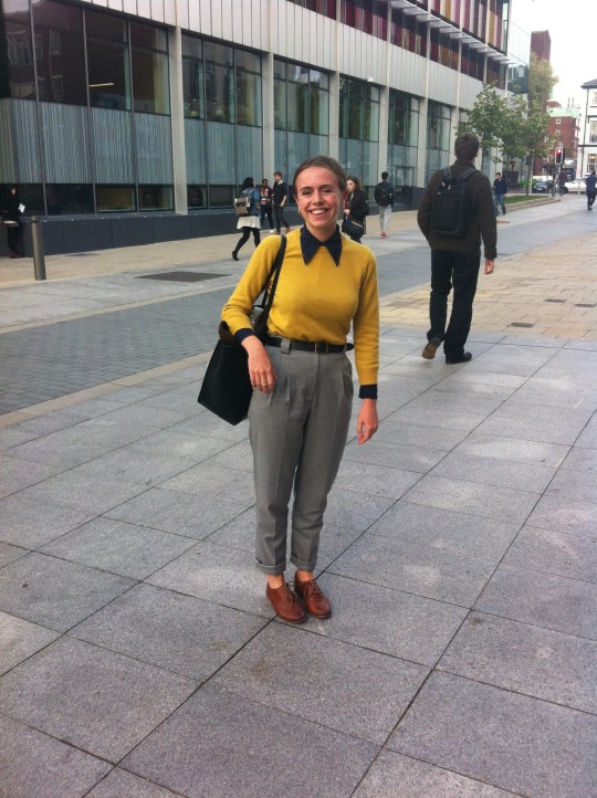 Tilly, Third Year, History. Tilly’s yellow jumper is a welcome reminder of sunshine, perfectly paired with a statement collar.