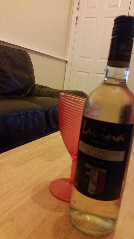 The ribbed pink wine glass is the only one we have in the house.